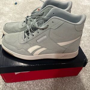 Women’s size 11 high top.
Seafoam green Reebok sneakers